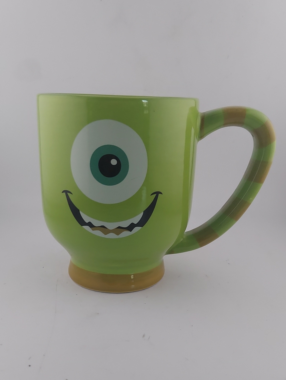 Disney ,Green One-Eyed Monster Ceramic Mug with Striped Handle